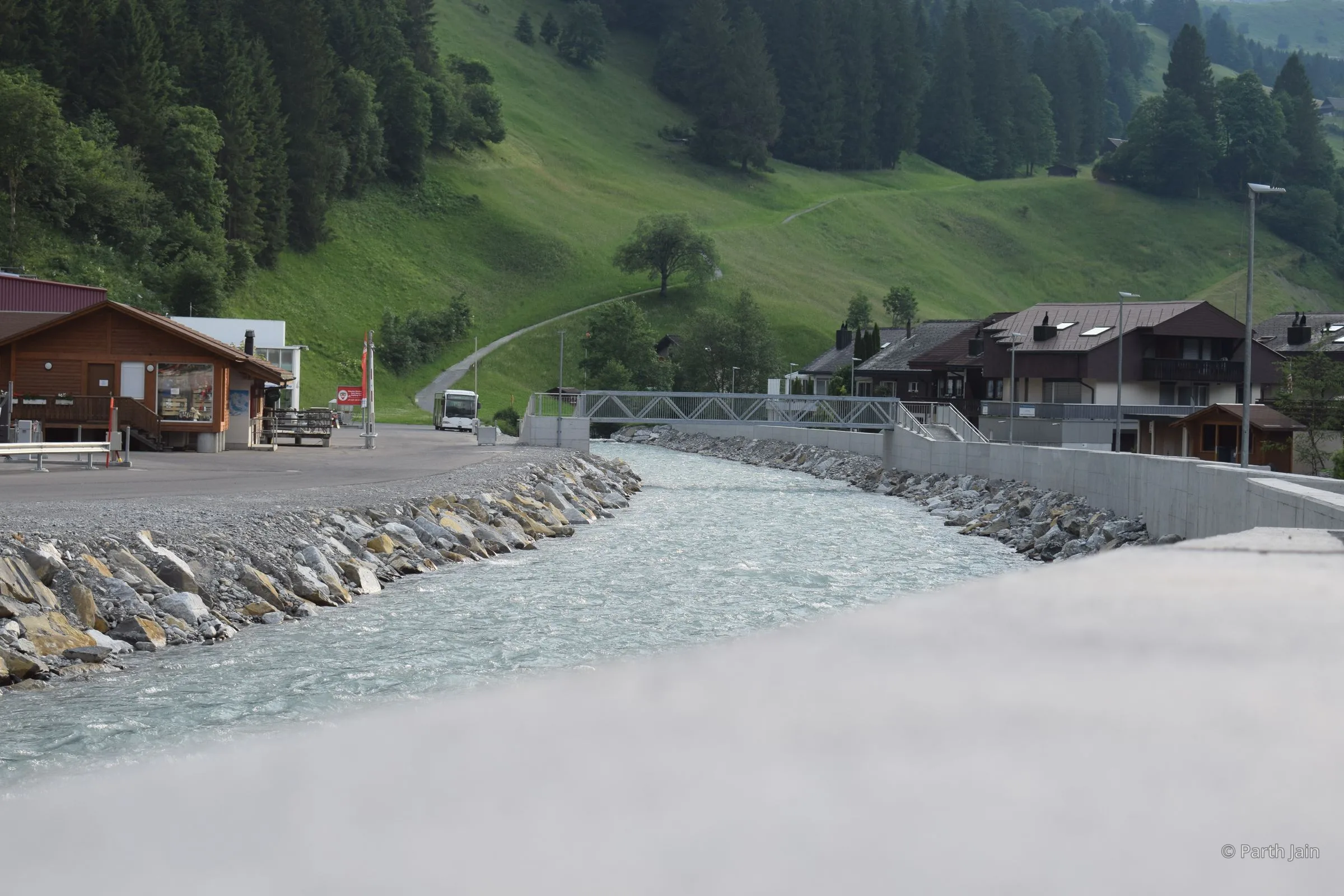 The Engelberg valley in the early morning, mist still on the meadows.