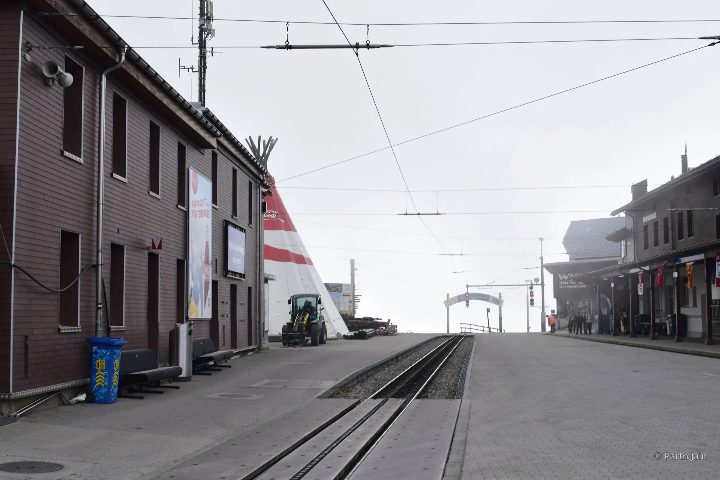 The Jungfraujoch viewing platform with fog moving across it.